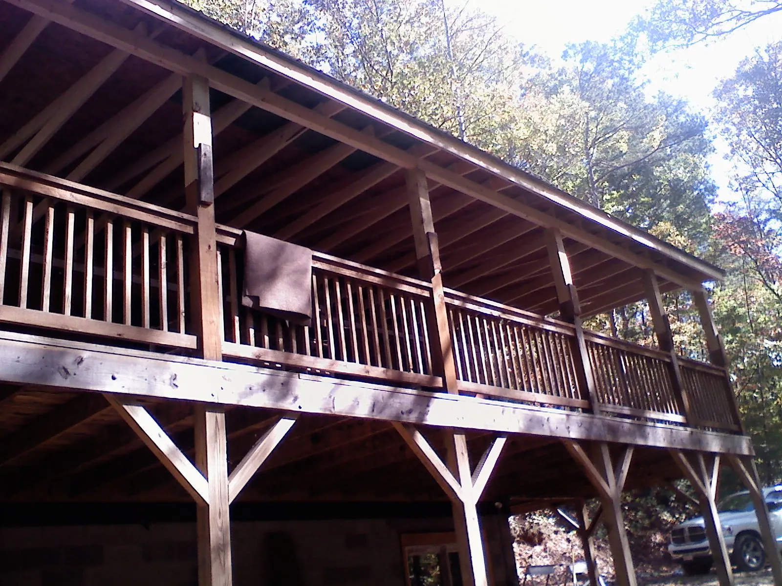 Timber framing under a new elevated porch and deck — Roof Leak Repair in Slaughters by Roofing Brothers